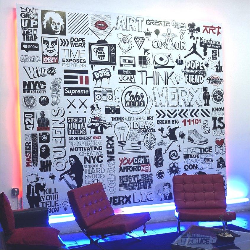Black-and-white icon wall with LED backlight in a lounge