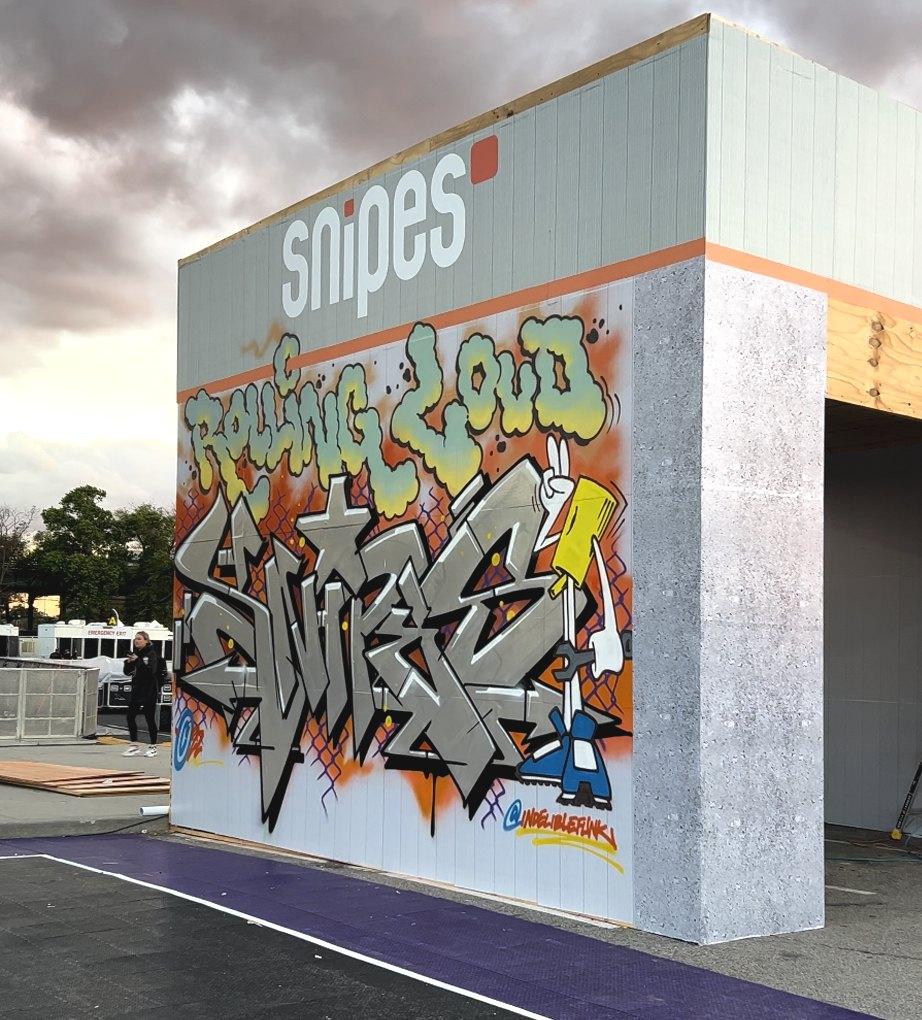 Graffiti-style printed wall for a Snipes activation at Rolling Loud