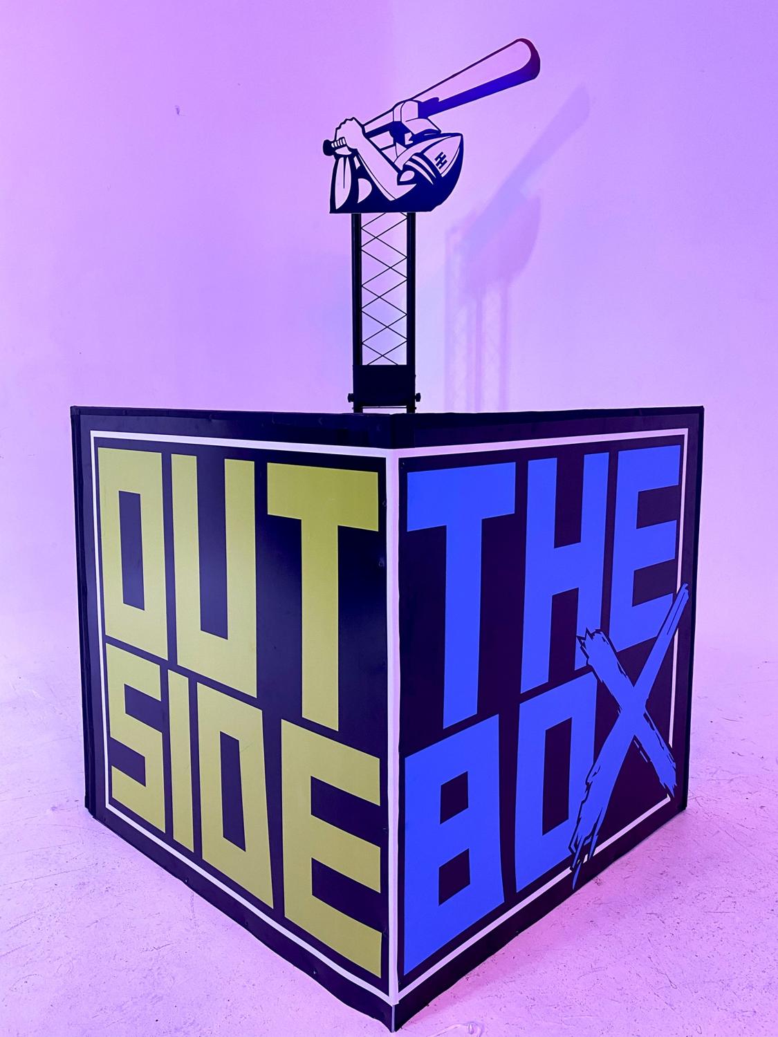 Outside The Box printed display cube with a cutout topper